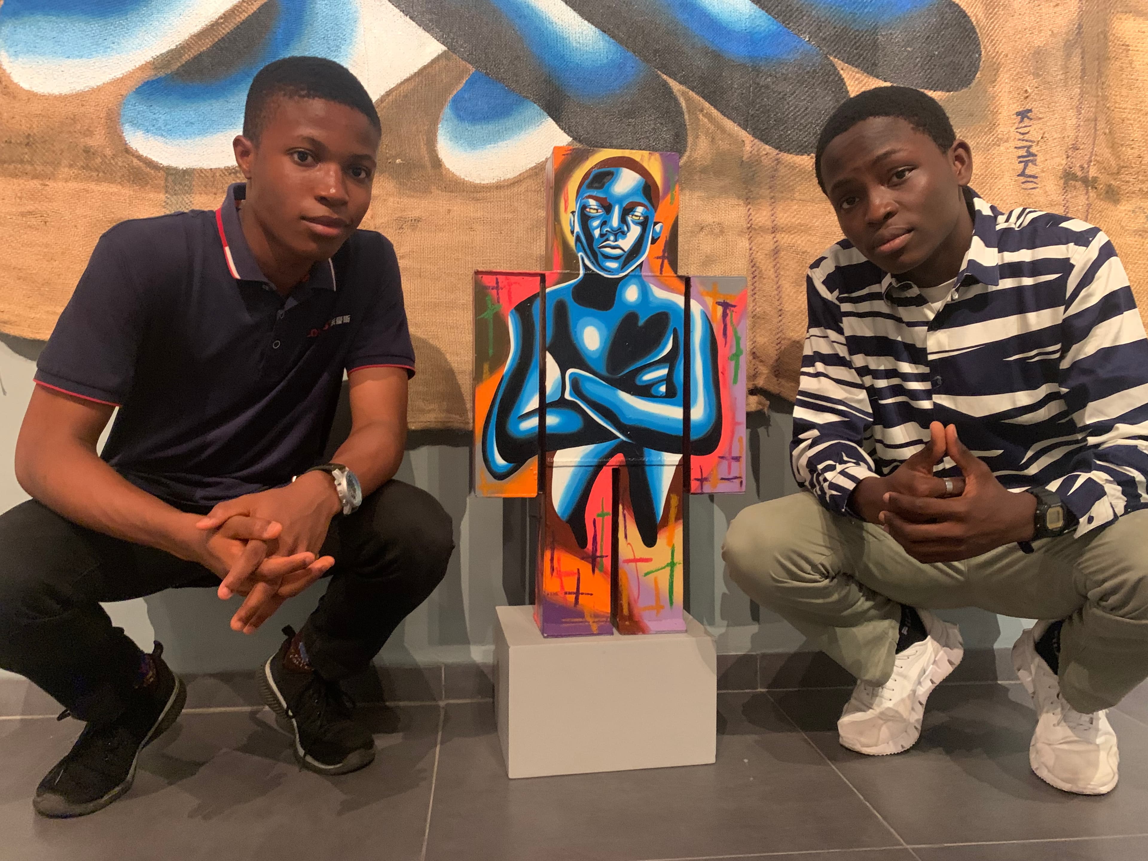 Boys engaged in art at the camp